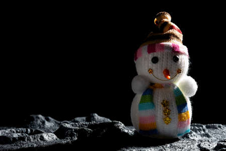snowman on a planet with cratersの写真素材