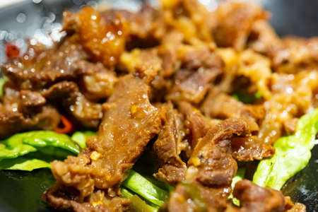 fresh braised veal cheeks on a dish