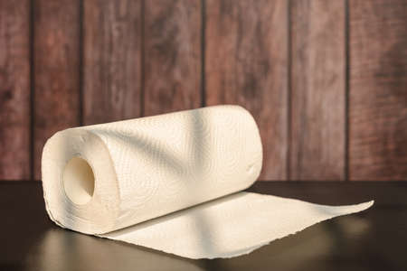 paper roll for kitchen near a window in a sunny morningの写真素材