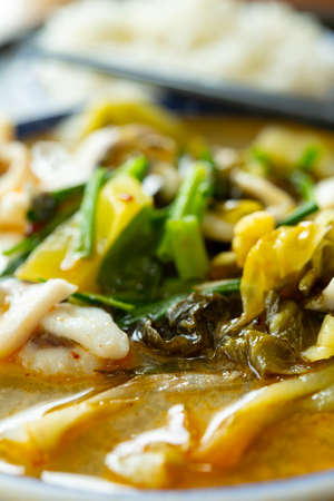 angle view fast food of spicy boiled fish with rice vertical compositionの写真素材