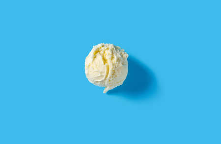 top view fresh vanilla flavor ice cream ball on blue backgroundの写真素材
