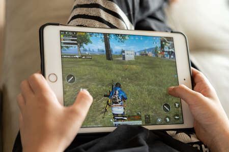 ZhongShan China-October 31,2020:kid playing a game named Game for peace.のeditorial素材