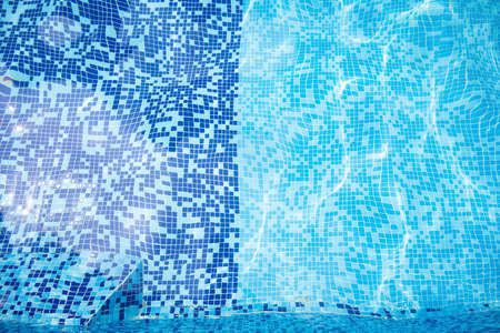 water surface of a swimming pool in a sunny dayの写真素材