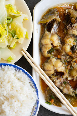 top view fast food of steamed Tang Yu with cabbage and rice vertical compositionの写真素材