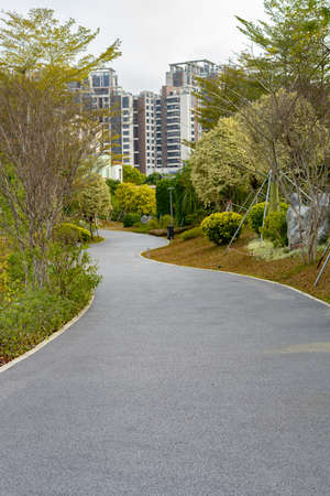 curved outdoor pathway in a parkの写真素材