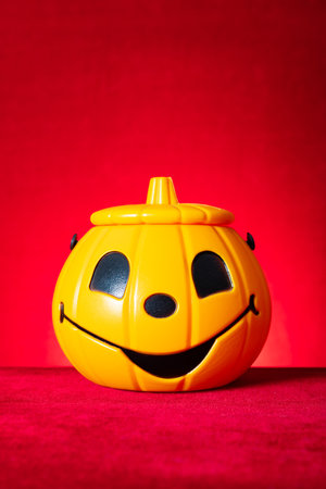 Jack O Lantern on a red background vertical compositionの写真素材