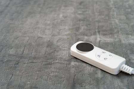 electric blanket with controller at horizontal compositionの写真素材