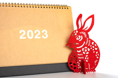 Chinese New Year of Rabbit mascot with 2023 calendar on white background translation of the Chinese is fortune no logo no trademarkの写真素材