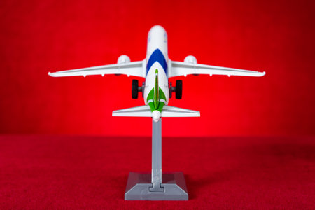 airplane model on a red background