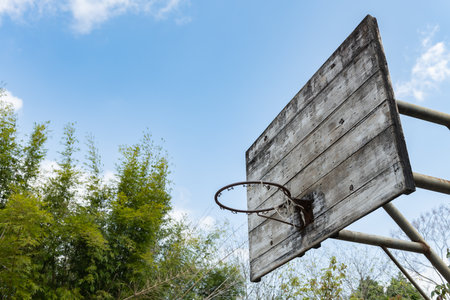 angle view basketball hoop and board under the blue sky horizontal compositionの写真素材