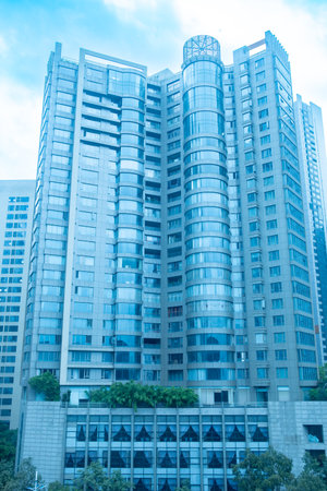 commercial buildings under blue sky at vertical composition