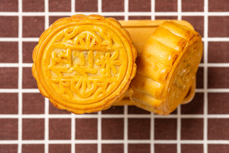 top view traditional mooncake horizontal composition the Chinese on the mooncake means five kernelsの写真素材