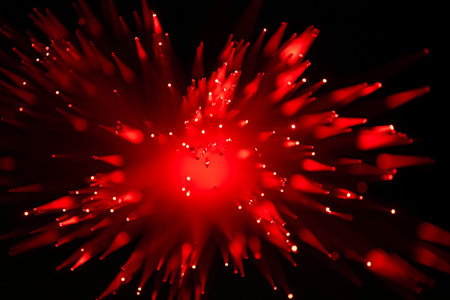red optical fibre in dark selective focus and kinda looks like coronavirus