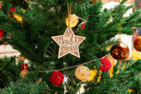 part of Christmas tree with decorations close up at horizontal composition