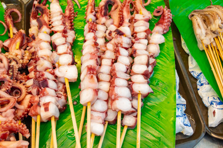 raw squid skewers at horizontal compositionの写真素材