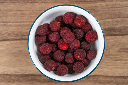top view bowl of fresh bayberries at horizontal composition