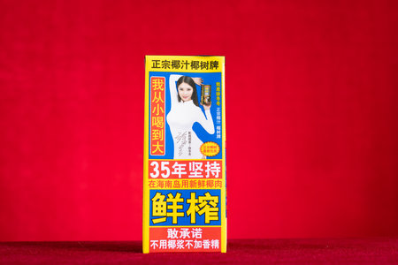 ZHONGSHAN China-July 1,2023:box of YeShu coconut milk on red at horizontal composition.のeditorial素材