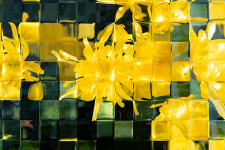 blooming yellow chrysanthemum seen through the glass close up horizontal composition