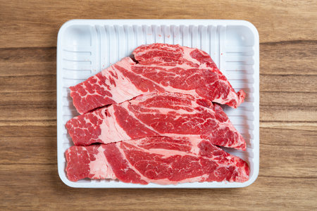 top view raw steaks at horizontal compositionの写真素材