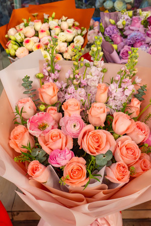 bunch of pink roses as present on sale at vertical compositionの写真素材
