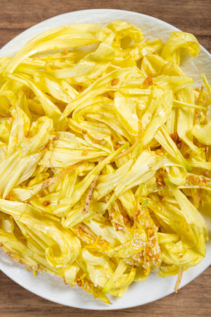 top view dish of chrysanthemum delicacy at vertical compositionの写真素材