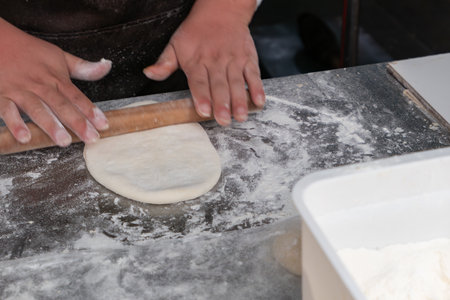 making Chinese style pancakes at horizontal composition