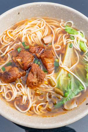 top view bowl of beef brisket noodles at vertical compositionの写真素材