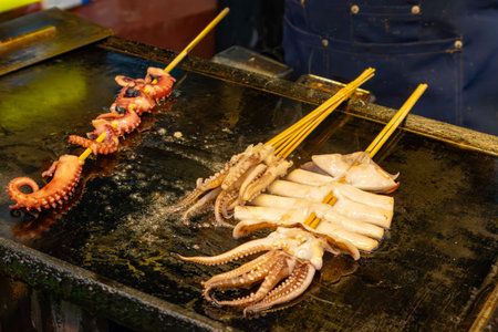 teppanyaki fried squids at horizontal compositionの写真素材