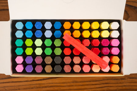 top view box of colorful chalksの写真素材