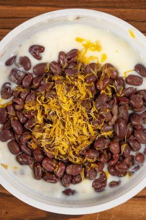 top view chrysanthemum and red bean double-skin milk at vertical compositionの写真素材