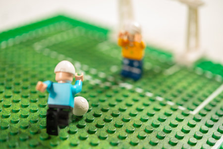 angle view toy brick soccer and soccer fieldの写真素材