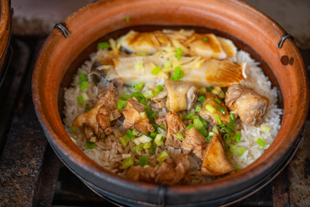 angle view clay pot rice of chicken and dried fish at horizontal compositionの写真素材
