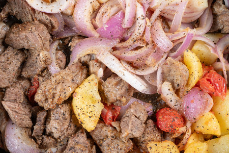 top view fresh home cooked beef dices on a panの写真素材