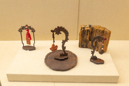 XiaPu FuJian China-August 14 2025: hand-carved wooden pendants in the XiaPu Museum in the XiaPu...