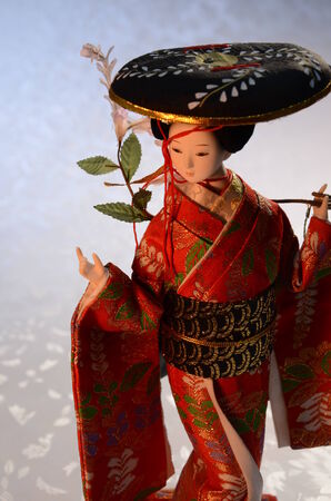 Traditional Japanese doll in Kimonoの写真素材