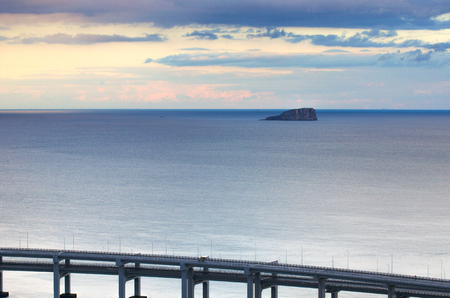 Sunset Great Sea Bridge at Dalian city in China.の写真素材