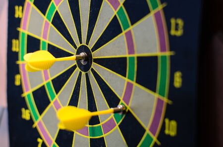 The dart flew off and hit the bull's eye.