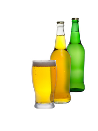 Glass and bottles of cider isolated on a white backgroundの写真素材