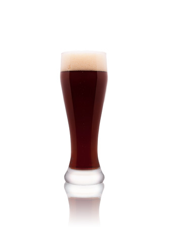 Glass of dark beer isolated on a white backgroundの写真素材
