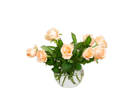 Roses bouquet in a glass vase isolated on a white backgroundの写真素材