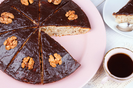 Homemade honey walnut pie and cup of coffeeの写真素材