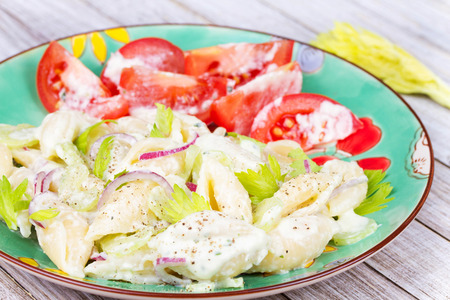 Creamy Pasta Salad with Celery and Red Onionの写真素材