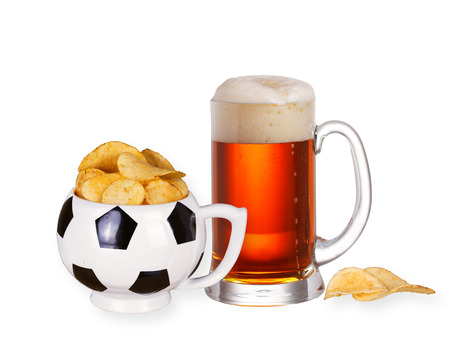 Glass of beer and crisps isolated on  white backgroundの写真素材