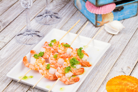 Shrimps with green butter sauseの写真素材
