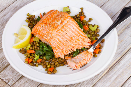 Steamed Salmon with Lentils and Arugulaの写真素材