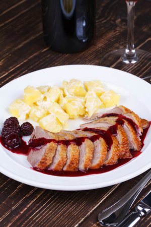 Duck breast fillet with blackberries and wine sauceの写真素材