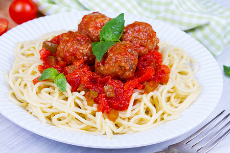 Spaghetti with meatballs in tomato sauceの写真素材