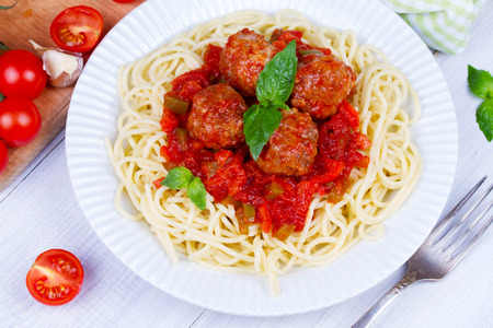 Spaghetti with meatballs in tomato sauceの写真素材