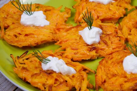 Carrot Pancakes With  Yogurt Sauceの写真素材