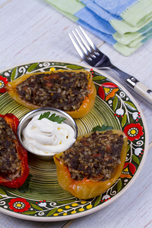 Baked Stuffed Peppers with Meat, Wild Rice, Vegetables and Greensの写真素材